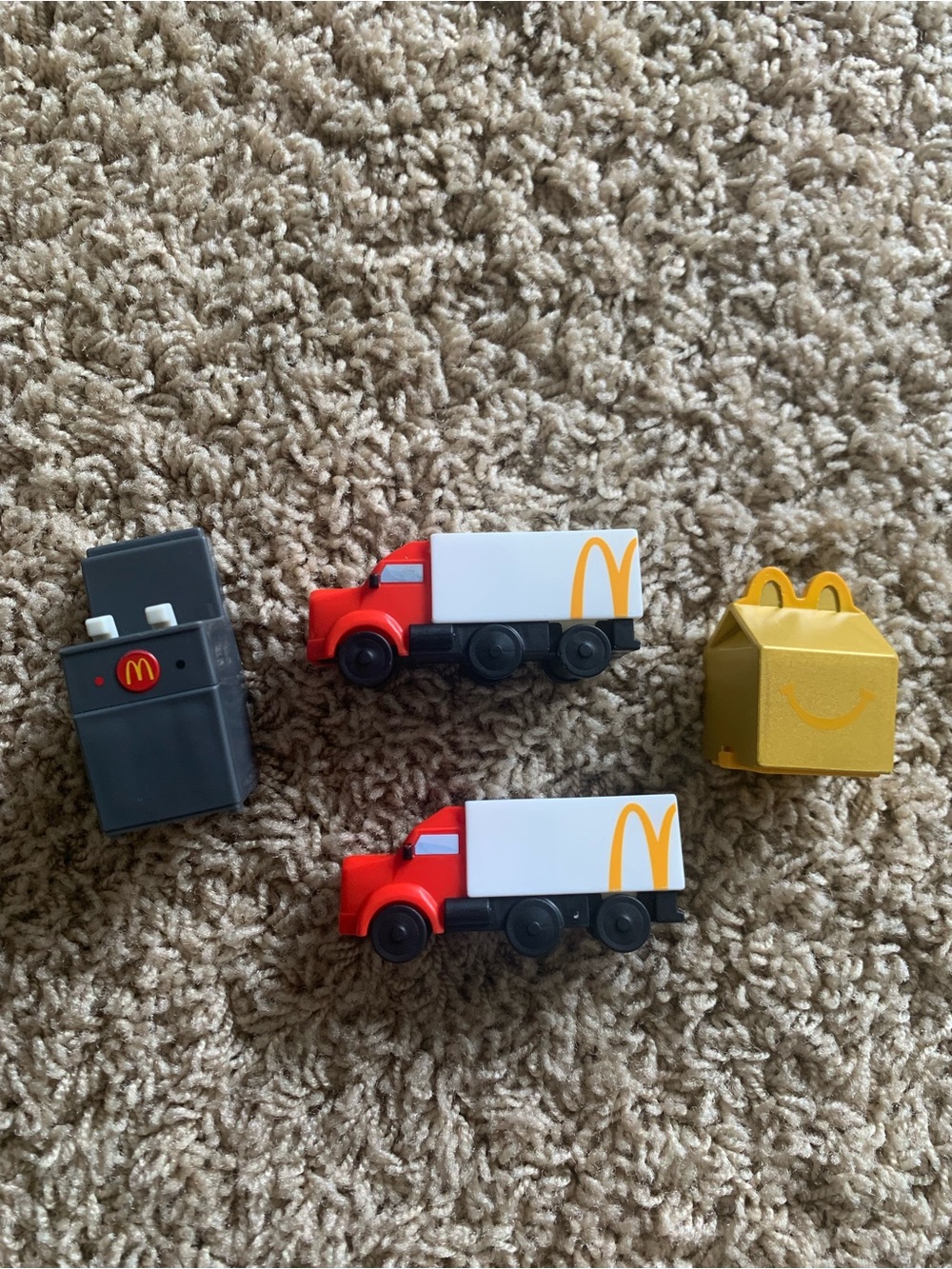 McDonald's Red and White Delivery Trucks with Gold Happy Meal Toy and grill
